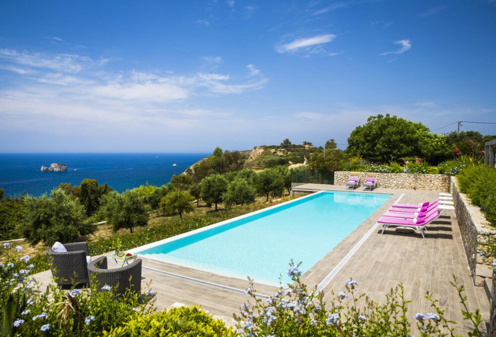 Our 2 bedrooms guest house is ideally built and equipped to offer maximum comfort and relaxation. The legendary views of the Ionian Sea along with the magnificent pool, the aromas of the surrounding carefully picked flowers and the amenities of this lovely stone house will turn your holidays into a magical trip.